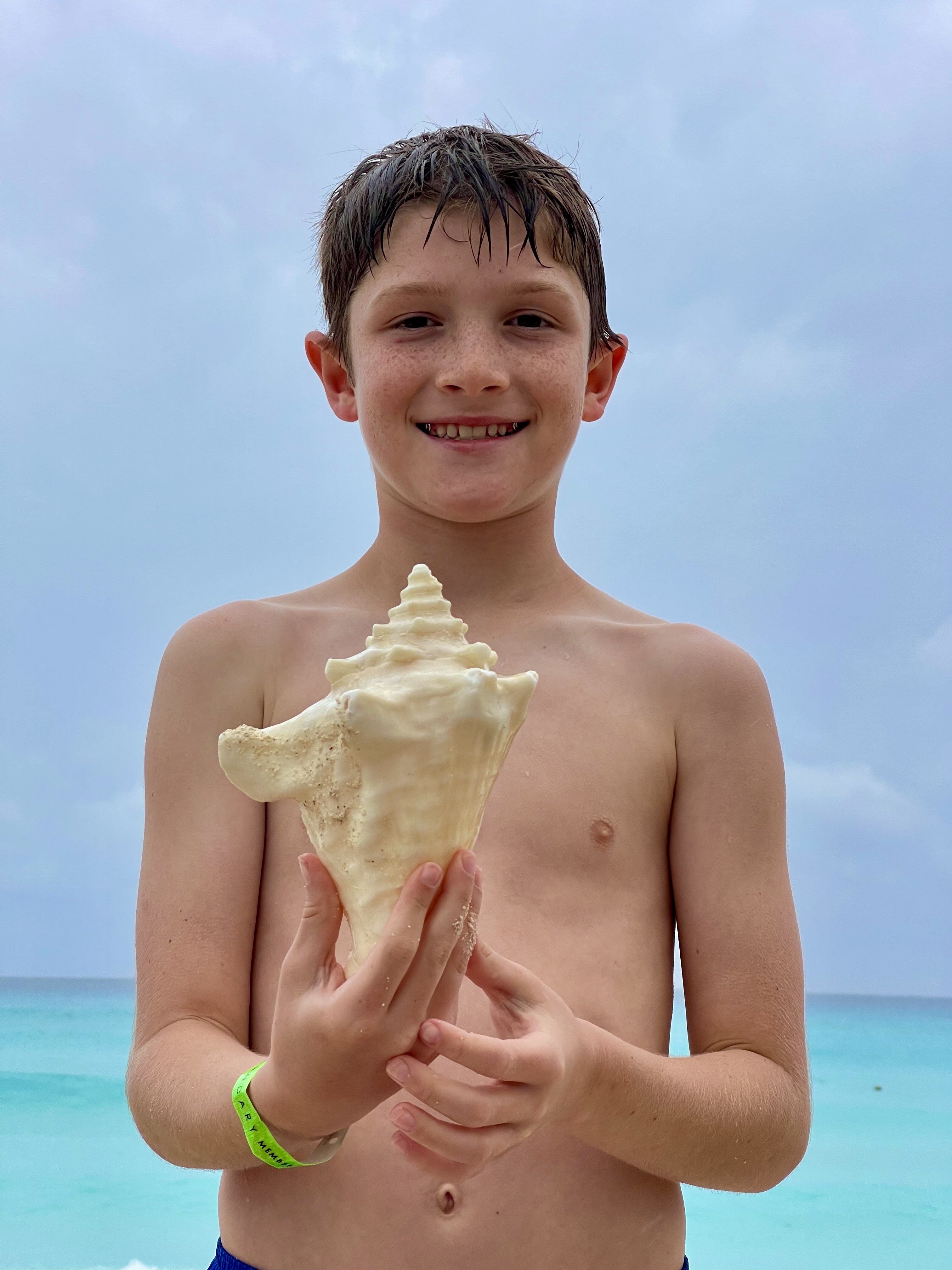 Boy with conch shell